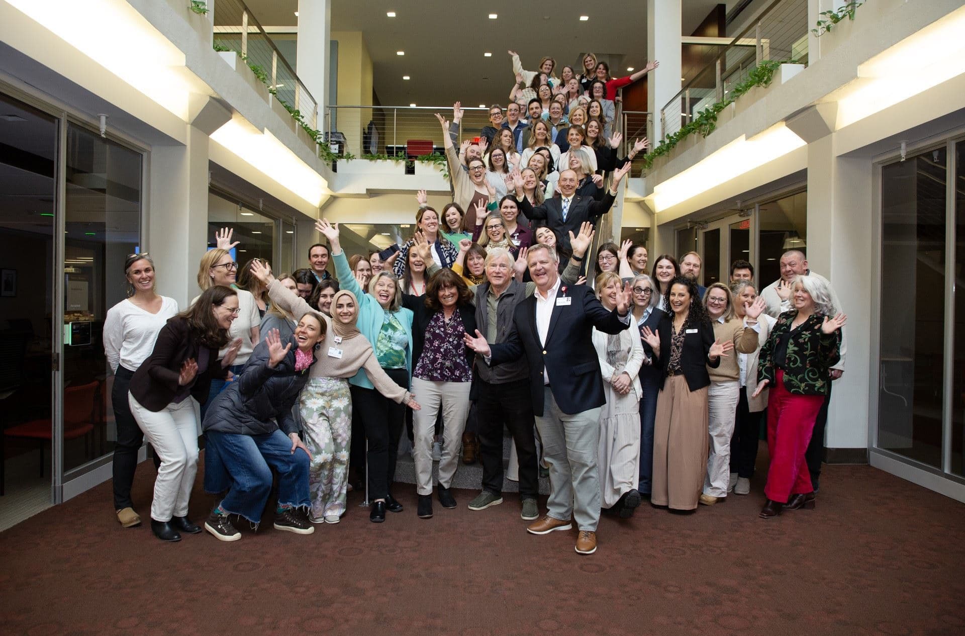 Coalition members taking a group photo together at an event